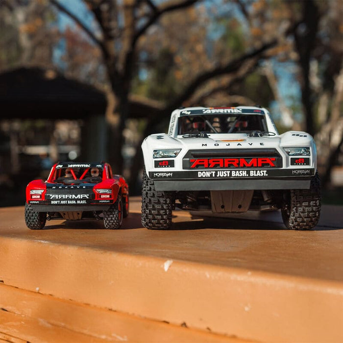 ARA2104T1 MOJAVE GROM MEGA 380 Brushed 4X4 Small Scale Desert Truck RTR with Battery & Charger, Red/Black ** IN STOCK EARLY JULY** (FOR A EXTRA BATTERY PLEASE ORDER SPMX142S30H2)